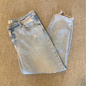 Light-wash, ripped jeans from Abercrombie & Fitch. The Mom, High Rise.